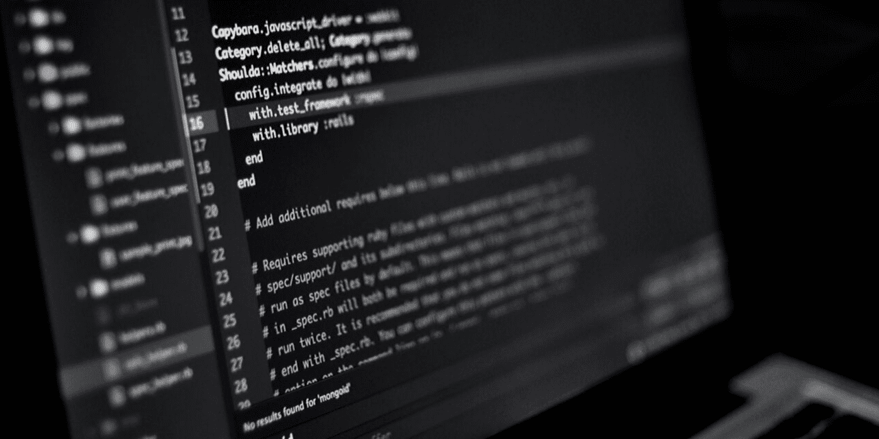 A black and white image depicting a computer screen, showcasing its minimalist design and digital interface.