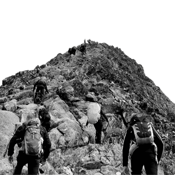 A diverse group of individuals ascending a rugged mountain, showcasing teamwork and determination in a natural landscape.