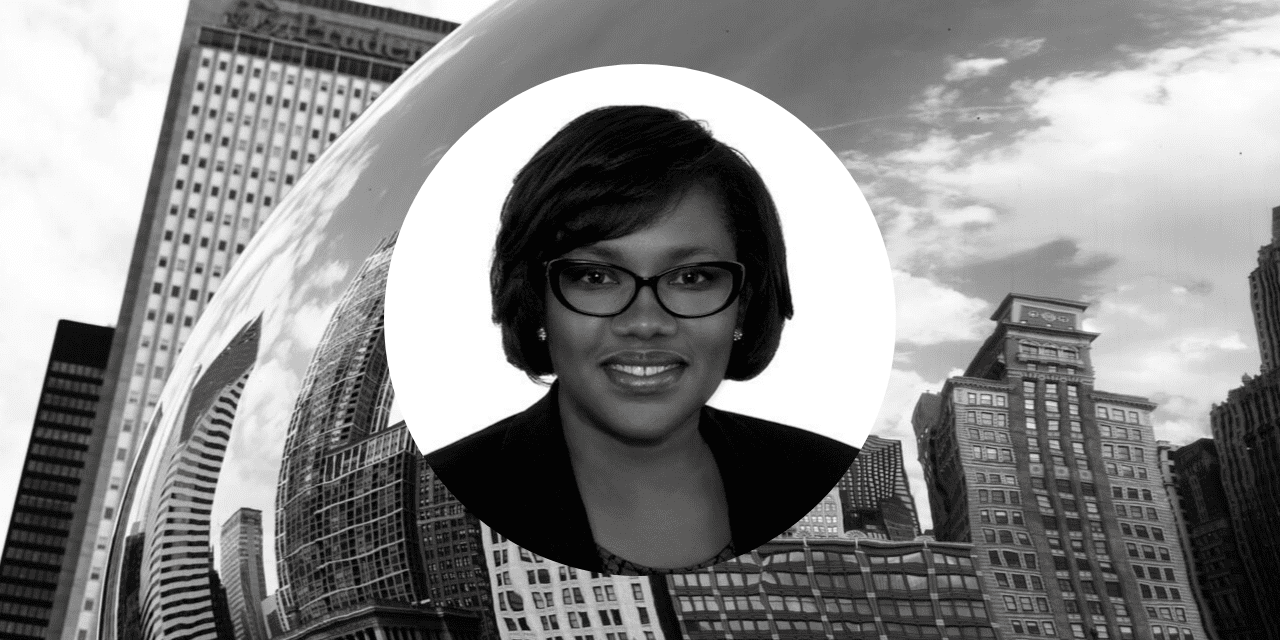 Donna Dorsey wearing glasses stands confidently in front of a bustling city skyline, showcasing urban life and diversity.