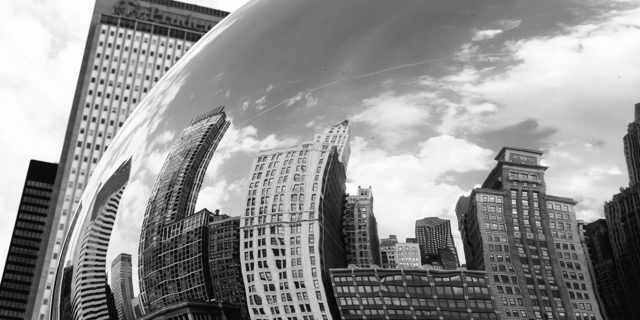 Black and white city skyline reflected in a cloud, showcasing a serene and artistic urban landscape.
